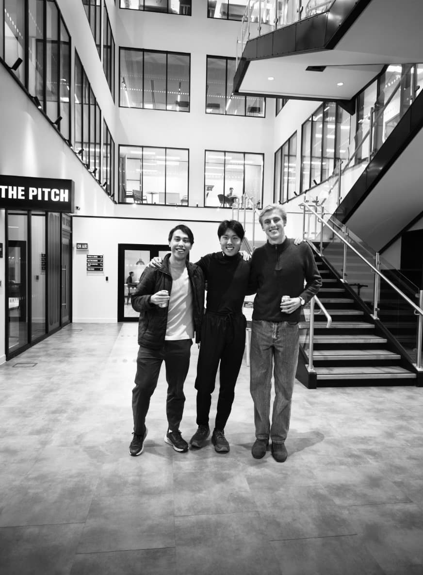 Nikolaus with two teammates after the hackathon